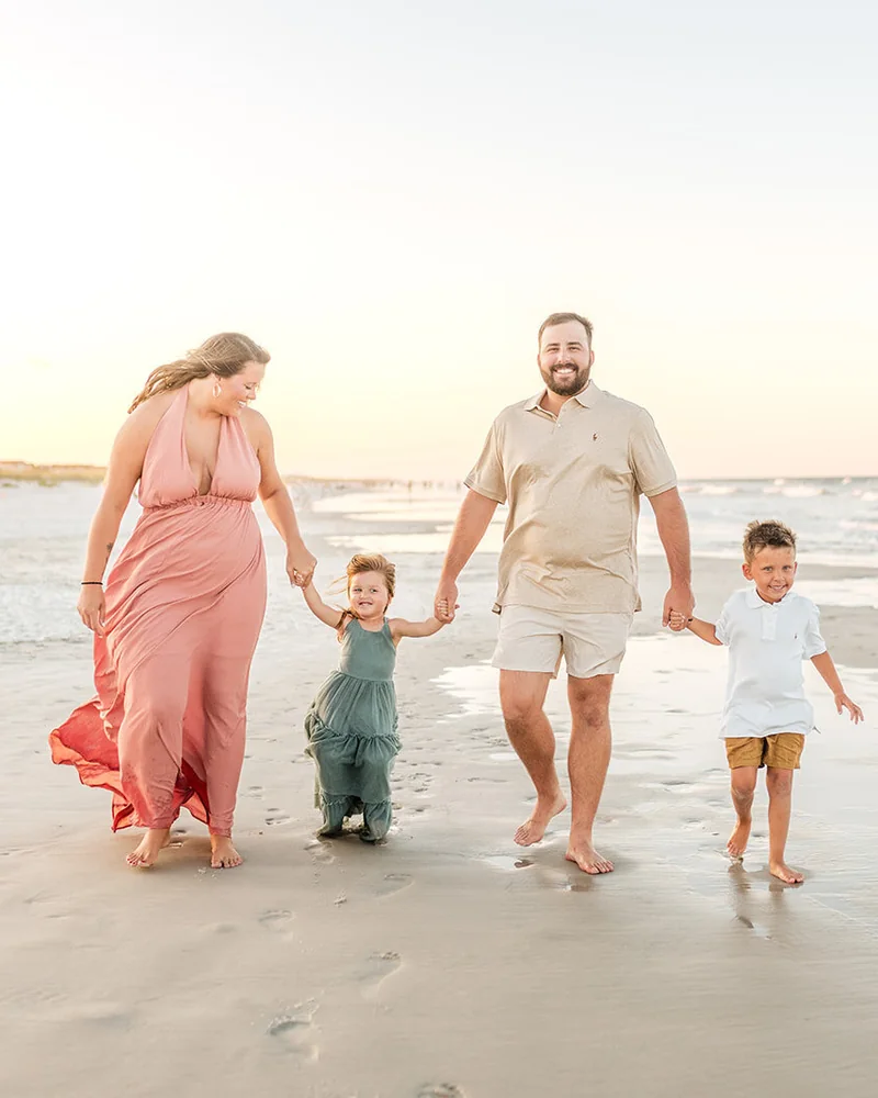 Parents and child during a Florida beach session