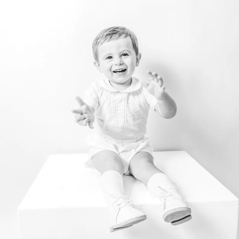 Young child photographed during a natural-light studio portrait session in Deltona