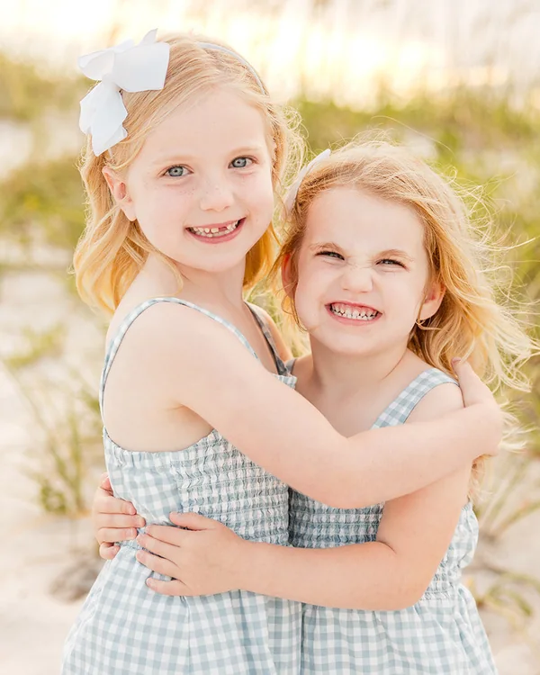 Children photographed together during a New Smyrna Beach family session