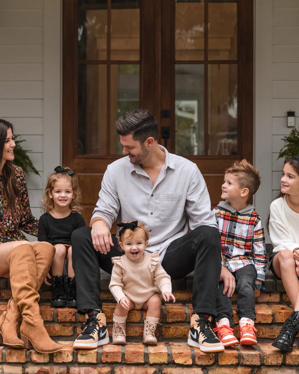 Family photographed outdoors during an Orlando family session